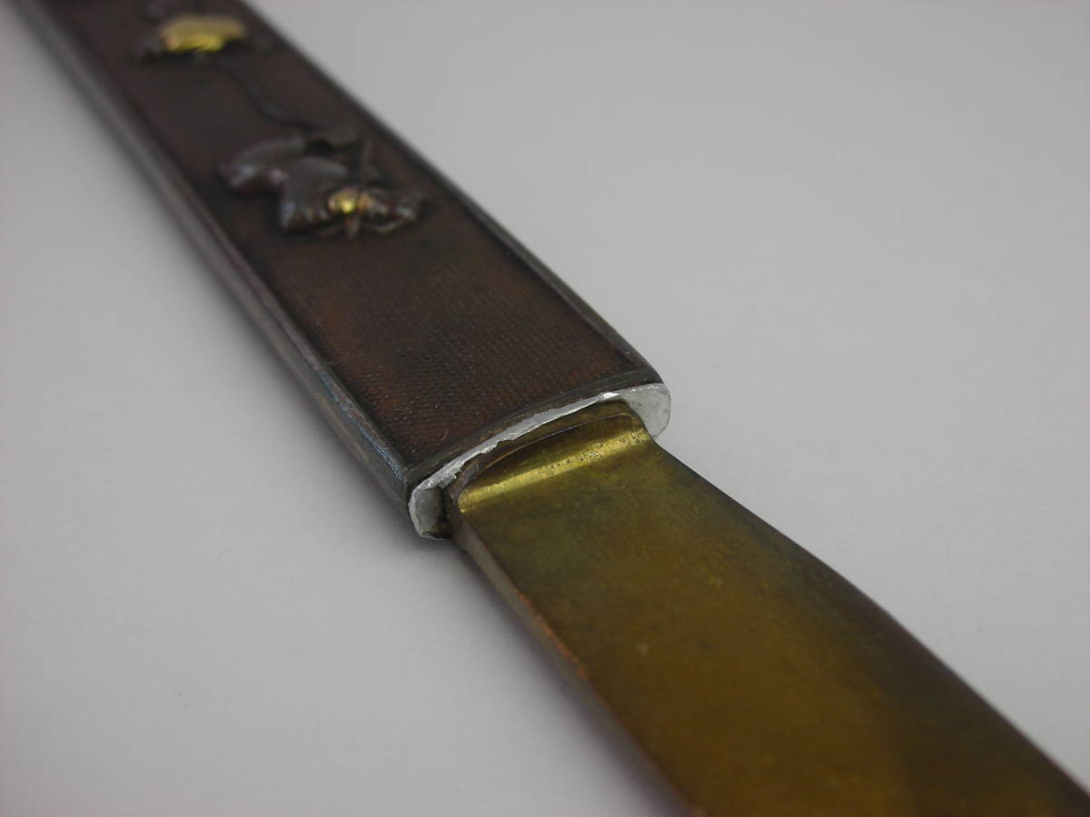 Kozuka Figure of a person pulling an old cow Petite Japan Antiques
