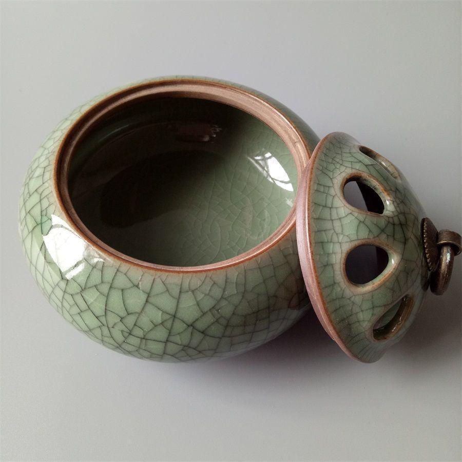 Openwork of the government kiln Celadon three-legged openwork incense