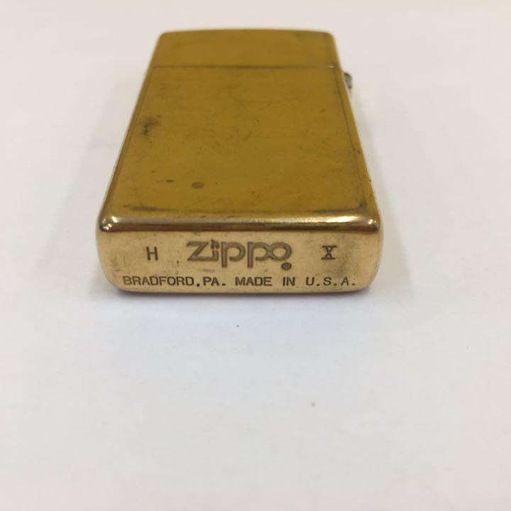 As is for parts ZIPPO lighter na-344.zippo SLIM ZIPPO SOLID BRASS made in 1994