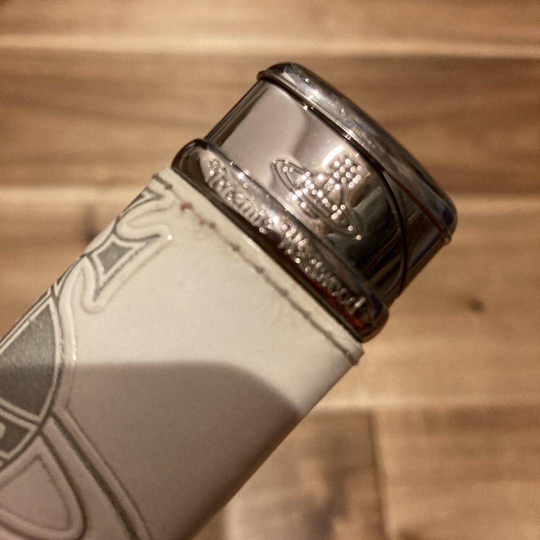 As is For Parts Vivienne Westwood Lighter  Leather color is white