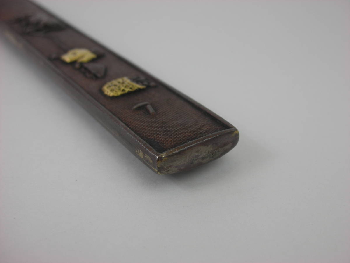 Kozuka Figure of a person pulling an old cow Petite Japan Antiques