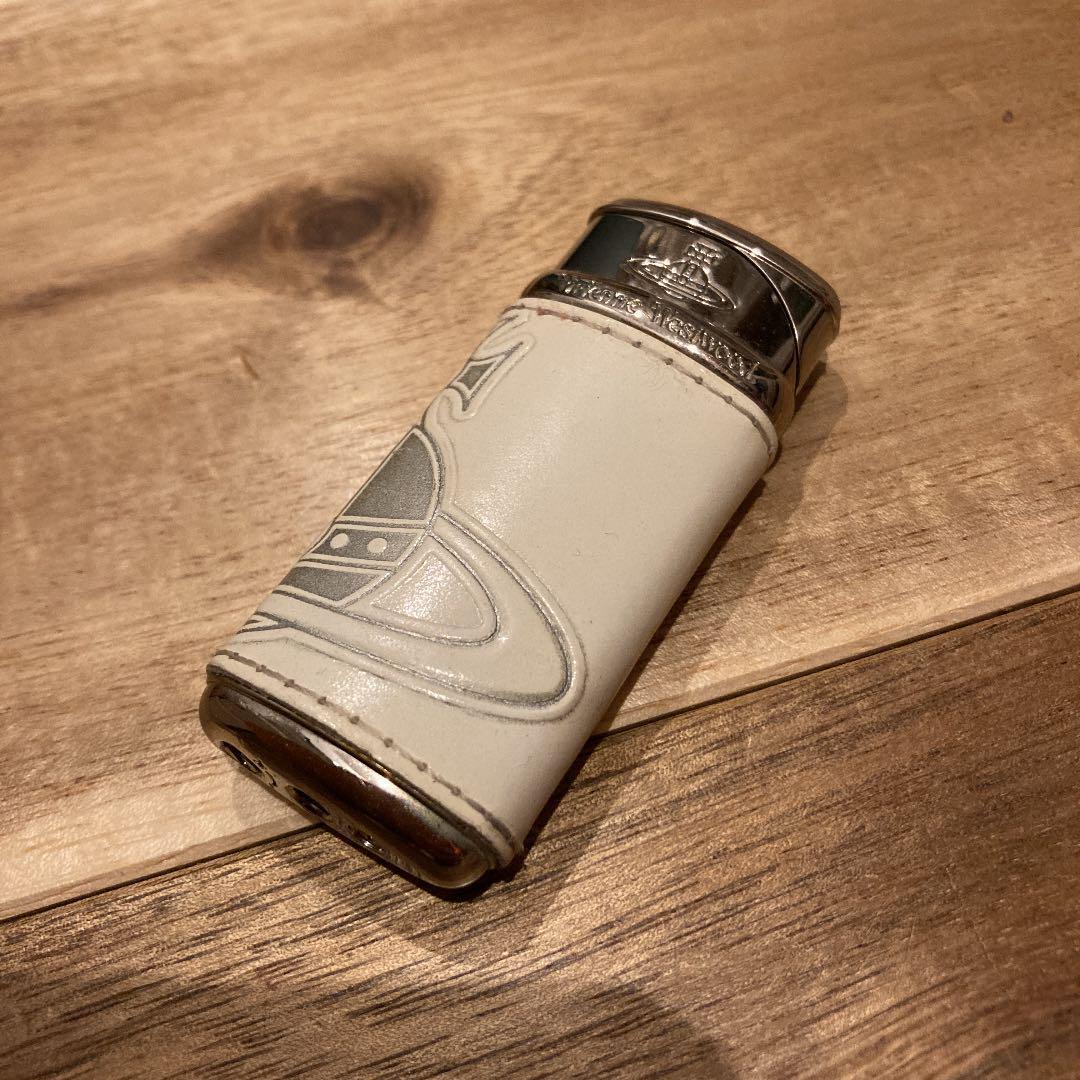 As is For Parts Vivienne Westwood Lighter  Leather color is white