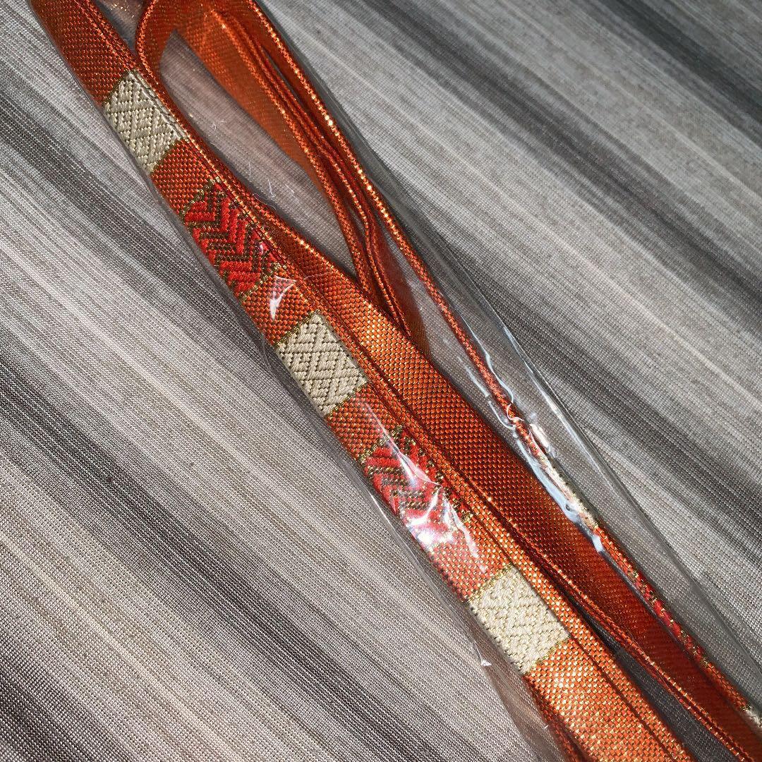 Unused pure silk Saga Nishiki obijime gold orange beige orange