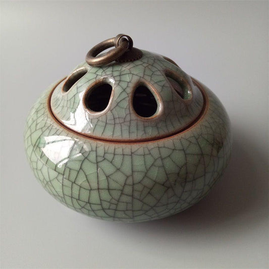 Openwork of the government kiln Celadon three-legged openwork incense