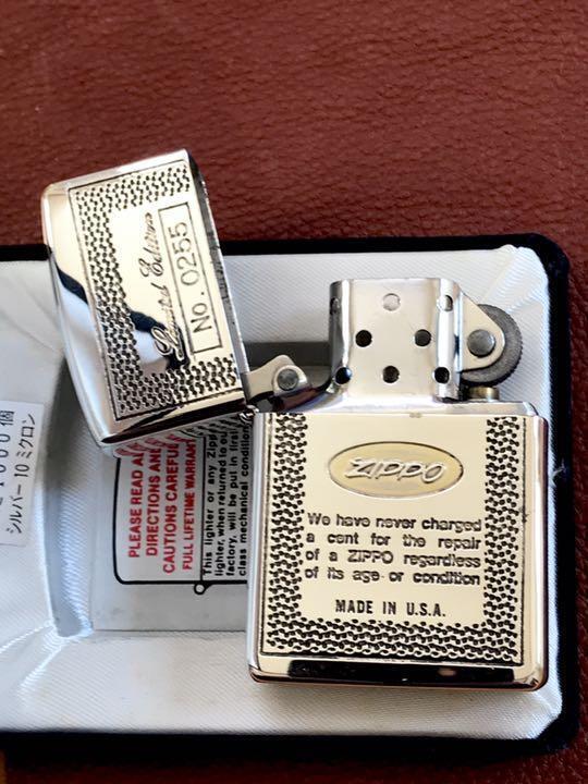 As is for parts zippo silver with serial number 1993 mint condition box 10μ silv