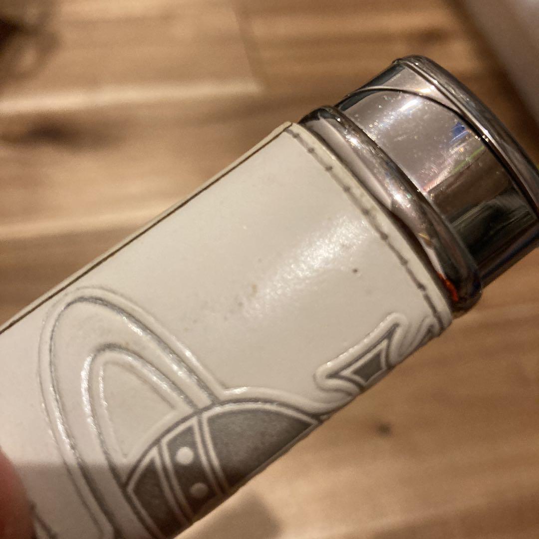 As is For Parts Vivienne Westwood Lighter  Leather color is white