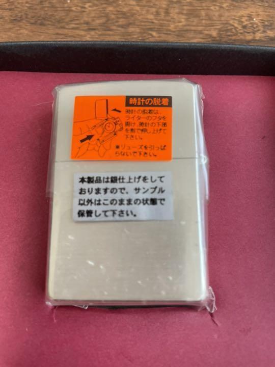 As is for parts Zippo Windy with clock serial number available
