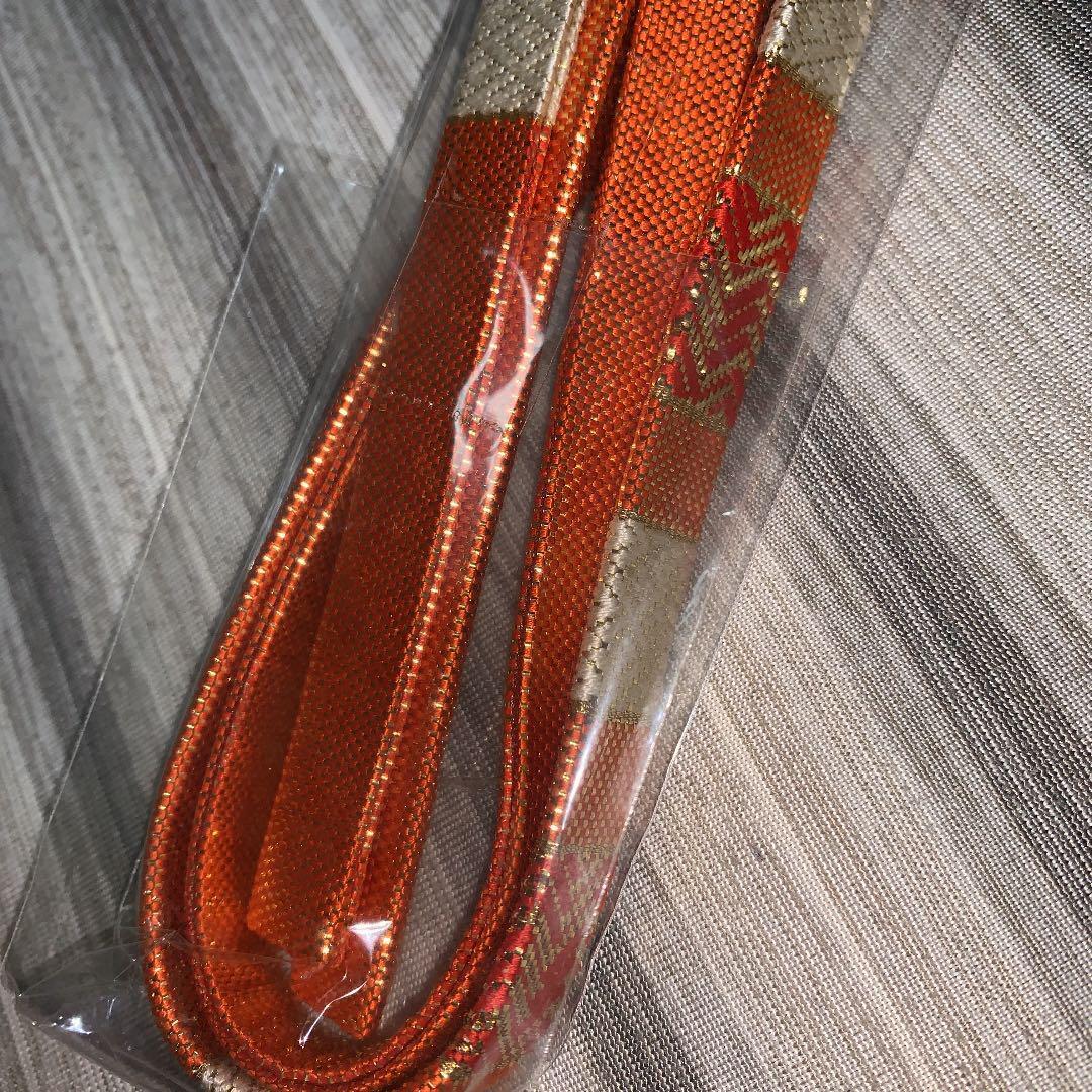 Unused pure silk Saga Nishiki obijime gold orange beige orange