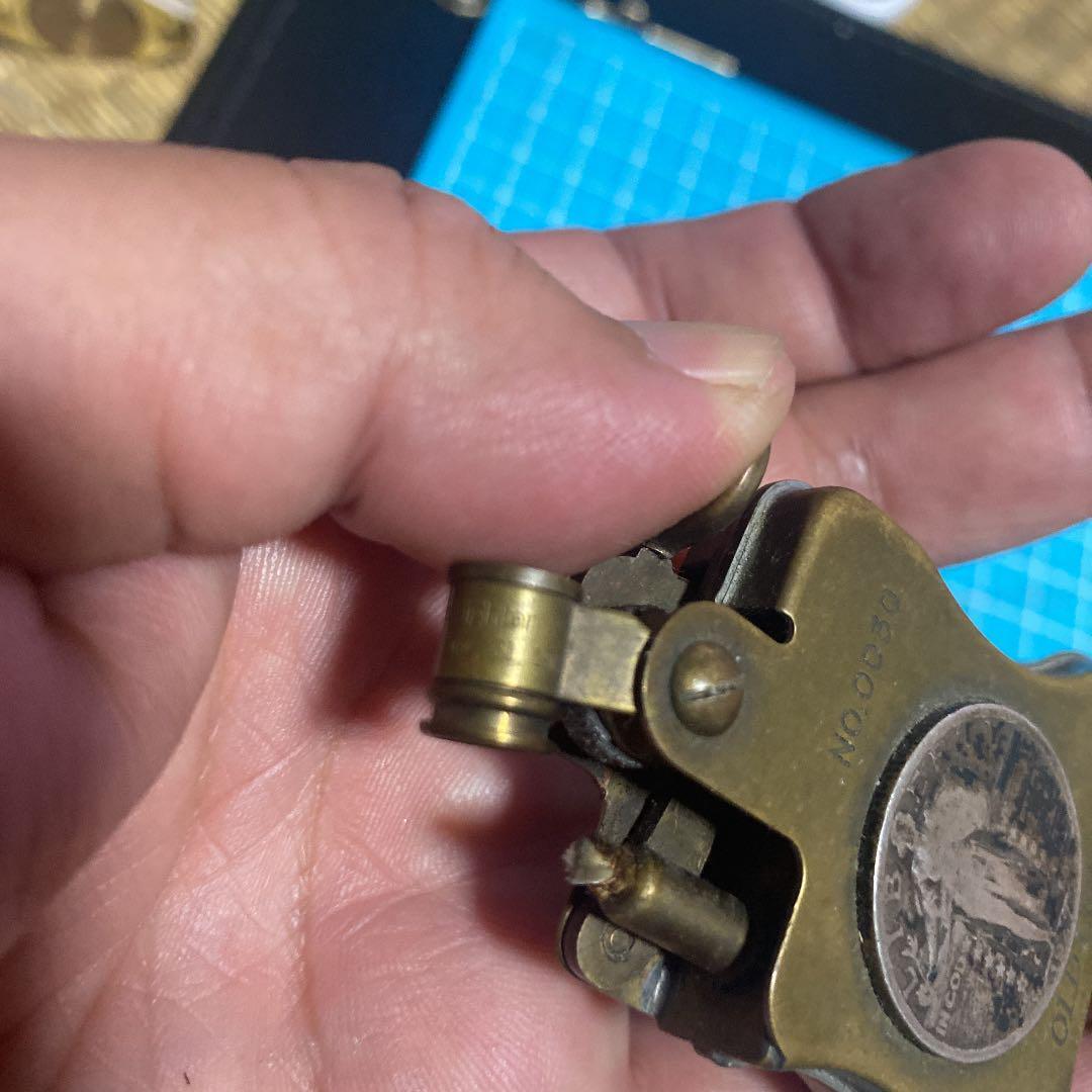 As is for Parts Ronson limited edition old coin oil lighter
