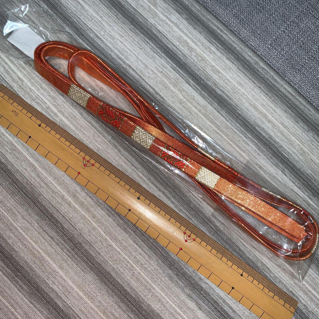 Unused pure silk Saga Nishiki obijime gold orange beige orange