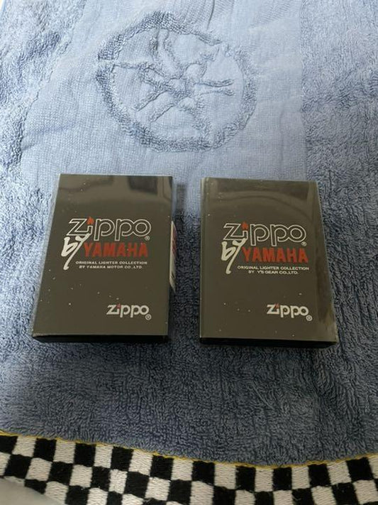 As is For Parts Yamaha RZ250/350 Zippo 2 piece set & Moto Legend RZ (book)