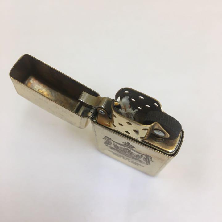 As is for parts ZIPPO lighter na-344.zippo SLIM ZIPPO SOLID BRASS made in 1994