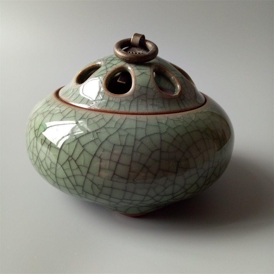 Openwork of the government kiln Celadon three-legged openwork incense