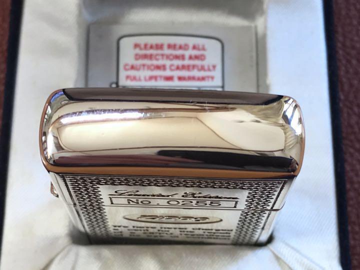 As is for parts zippo silver with serial number 1993 mint condition box 10μ silv