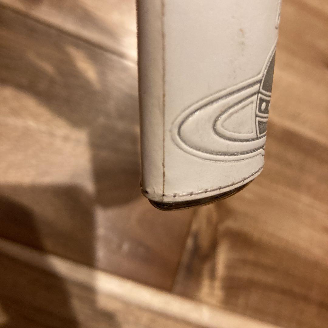 As is For Parts Vivienne Westwood Lighter  Leather color is white