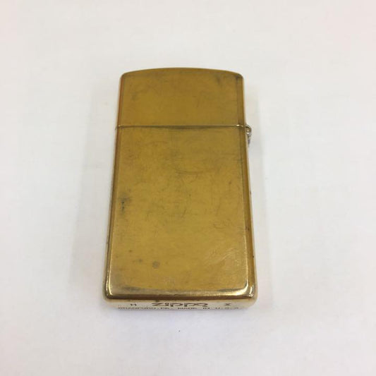 As is for parts ZIPPO lighter na-344.zippo SLIM ZIPPO SOLID BRASS made in 1994