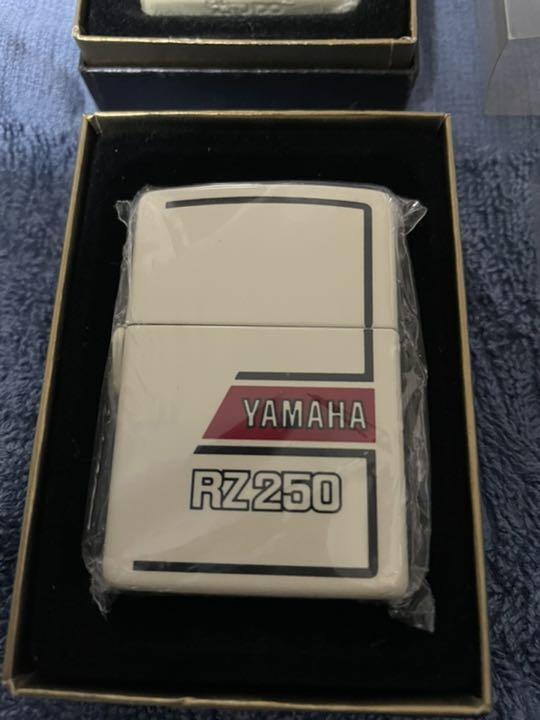 As is For Parts Yamaha RZ250/350 Zippo 2 piece set & Moto Legend RZ (book)
