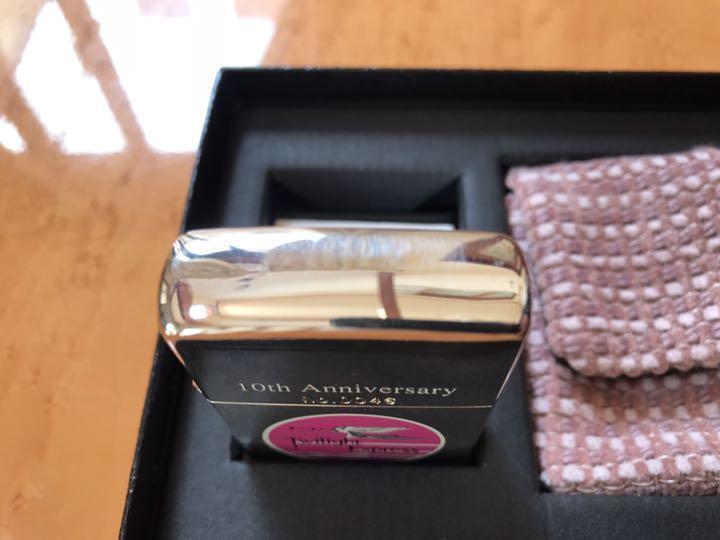 As is for parts zippo Twilight Express 10th anniversary with case 1999 unused