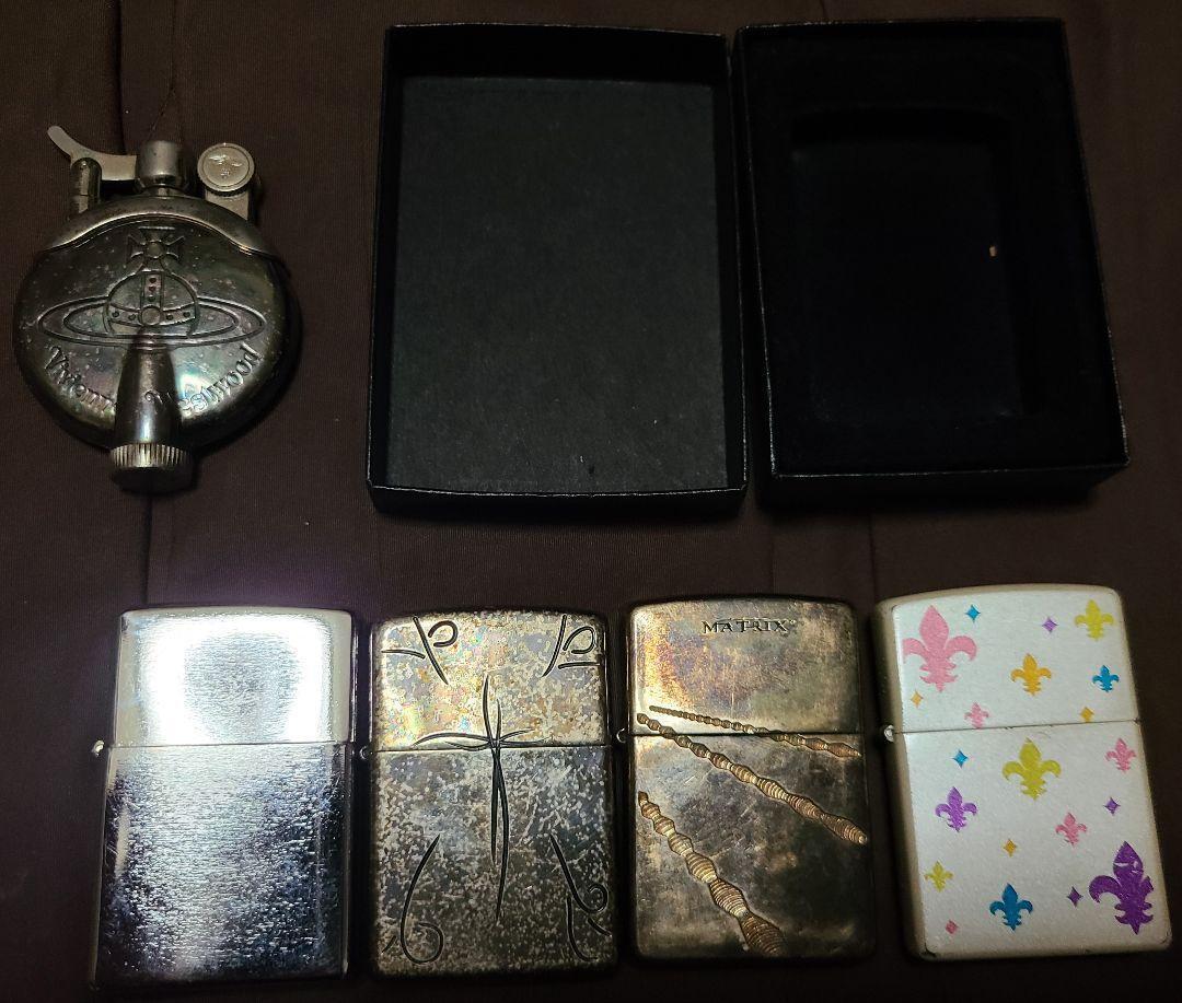 As is For Parts  Vivienne Westwood  Zippo 1 Vivienne lighter set
