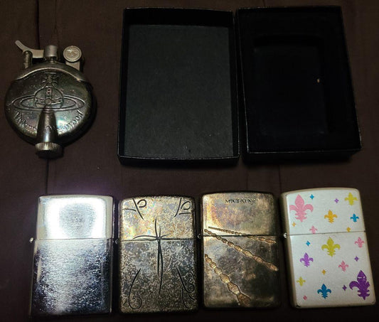 As is For Parts  Vivienne Westwood  Zippo 1 Vivienne lighter set