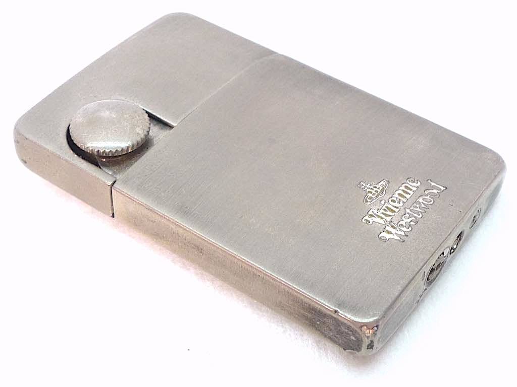 As is For Parts Vivienne Westwood thin gas lighter silver stainless steel