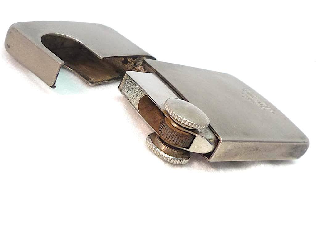 As is For Parts Vivienne Westwood thin gas lighter silver stainless steel