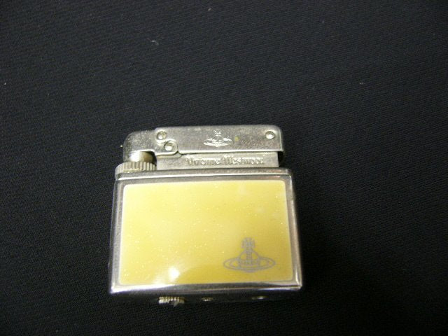 As is For Parts Vivienne Westwood Lighter Orb Ignition unconfirmed