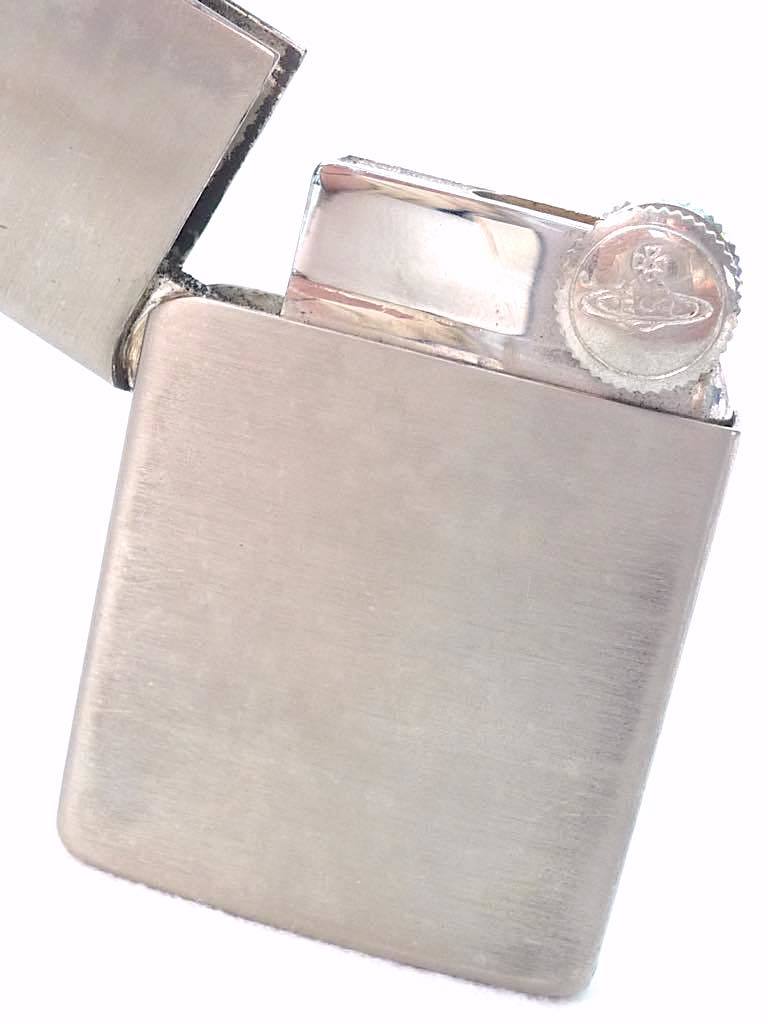 As is For Parts Vivienne Westwood thin gas lighter silver stainless steel