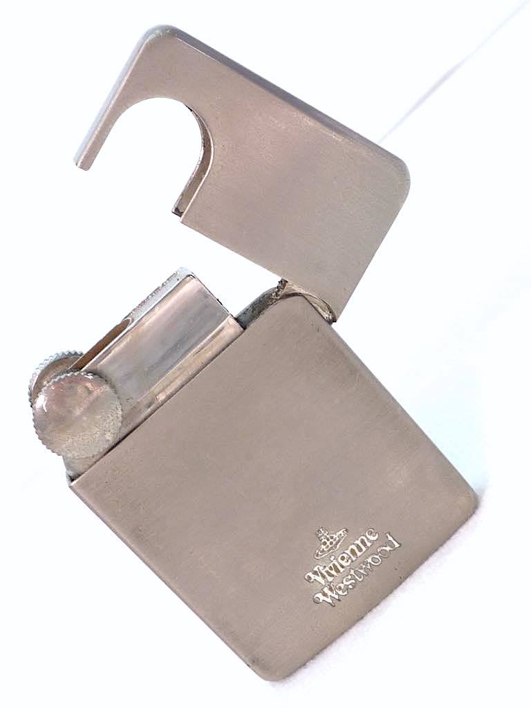 As is For Parts Vivienne Westwood thin gas lighter silver stainless steel