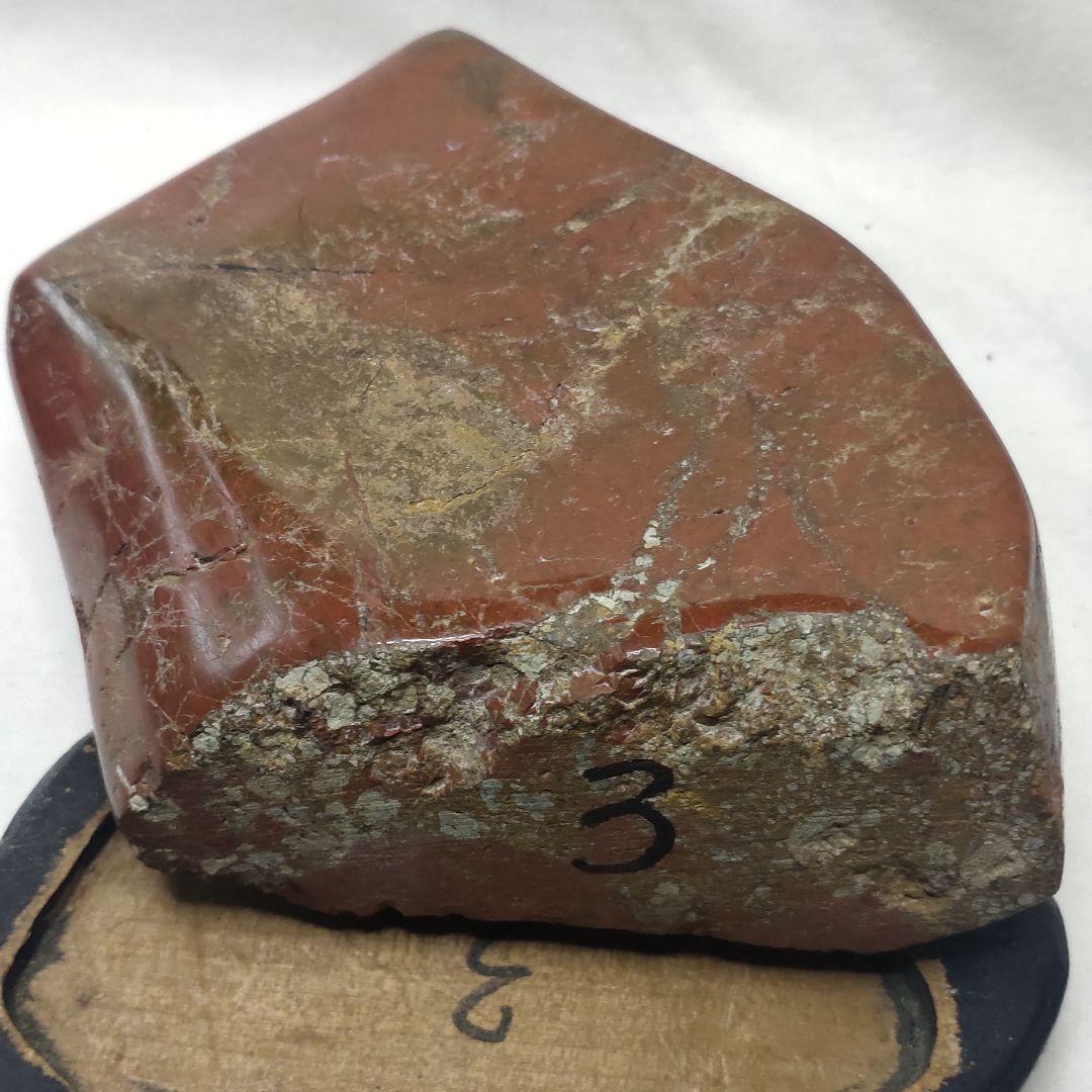 Red cobble stone figurine from Hokkaido Natural stone